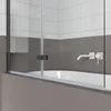 A close-up view of a modern bathroom with a bathtub and a shower screen. Anteprima dell’immagine prodotto