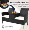 A black rattan garden bench with cream cushions and a built-in table holding drinks and fruit. An inset shows storage space within the bench. Produktbild-Vorschau