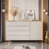 A modern dresser with drawers and a cabinet, decorated with a bust, a painting, and a vase of dried flowers. Produktbild-Vorschau