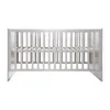 A light gray wooden crib is shown against a white background. Produktbild-Vorschau