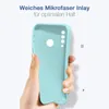 A hand holding a light blue phone case against a light background. Produktbild-Vorschau