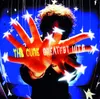 A person's hand is reaching out towards the camera, with text overlayed on the palm. The background is a blurry blue with hanging stars. Produktbild-Vorschau