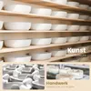 A collage of images showing white ceramic washbasins on shelves and close-ups of pottery craftsmanship. Anteprima dell’immagine prodotto