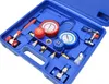 A set of tools for testing refrigerant pressure in air conditioning systems, neatly arranged in a blue plastic case. Produktbild-Vorschau