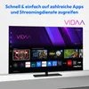 A television screen displaying the VIDAA smart TV interface with various app icons and recommended content. Produktbild-Vorschau