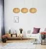 A living room scene with a sofa, a cabinet, and hanging lamps. Produktbild-Vorschau