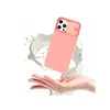 A hand is holding a peach-colored phone case with a camera cover, with a splash of liquid behind it. Produktbild-Vorschau
