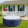 An inflatable hot tub sits on a grassy lawn in front of a house with a porch. Podgląd zdjęcia produktu