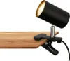 A black desk lamp with a gold interior is clamped to a wooden surface. Náhled obrázku produktu