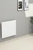 A white folding table mounted on a gray wall, with two framed pictures above it and a light-colored wooden floor below. Produktbild-Vorschau