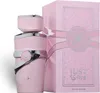 A pink perfume bottle and its box are displayed against a white background. Voir les images du produit