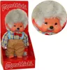 A Monchhichi doll in its packaging, with a close-up inset of the doll's face. Náhľad obrázku produktu