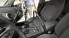 A person is vacuuming the interior of a car. Voir les images du produit