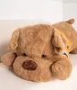 A large, plush dog toy lying on a light-colored surface. Podgląd zdjęcia produktu