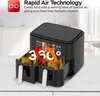 A black dual-chamber air fryer is shown on a countertop with a kitchen background. Text overlays describe its features. Produktbild-Vorschau