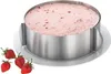 A stainless steel adjustable cake ring with a strawberry mousse cake inside, and a few strawberries on the side. Podgląd zdjęcia produktu