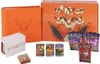 A collection of Pokemon trading cards and accessories, including a binder, box, and booster packs, all themed around Flareon. Produktbild-Vorschau