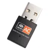 A close-up studio shot of a black USB Wi-Fi adapter with 'WIFI AC' and '600M Wireless USB Adapter' printed on it. Produktbild-Vorschau