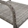 Close-up view of the armrest and seat of a gray rattan chair. Produktbild-Vorschau