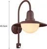 A brown outdoor wall light with a motion sensor. Produktbild-Vorschau
