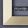 A close-up of a picture frame with a text overlay. Produktbild-Vorschau