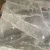 A close-up view of a marble-patterned surface, likely a tabletop. Produktbild-Vorschau