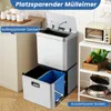 A multi-compartment trash can with a sensor-activated lid is shown in a kitchen setting, with other kitchen items visible in the background. Podgląd zdjęcia produktu