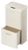 A cream-colored trash can with a pull-out drawer. Voir les images du produit