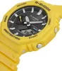 A close-up, angled view of a yellow Casio G-Shock watch against a white background. Náhled obrázku produktu