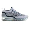 A side view of a Nike Air Vapormax 2021 FK SE shoe against a white background. Voir les images du produit