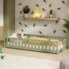 Lit d'enfant au sol avec barrières de sécurité et sommier à Voir les images du produit 1