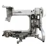 The internal metal frame of a sewing machine is shown against a white background. Náhľad obrázku produktu