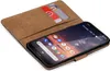 A brown book-style phone case with two credit cards inserted, holding a black smartphone. Náhled obrázku produktu