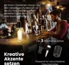 A bar scene with a man working on a laptop, a bottle lamp, and beer taps. Anteprima dell’immagine prodotto