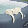 A close-up view of a beige cup holder accessory attached to the side of a gray inflatable hot tub. Podgląd zdjęcia produktu
