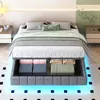 A bed with storage underneath, illuminated by blue LED lights. Náhľad obrázku produktu