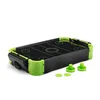 A mini air hockey table with green accents and two pucks and two mallets in front of it, set against a white background. Náhľad obrázku produktu