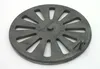 A round metal grate with radial slots and a central raised hub, placed on a white background. Podgląd zdjęcia produktu