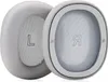 Two ear pads for headphones, one marked 'L' and the other 'R'. Voir les images du produit