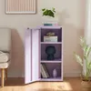 A lilac metal cabinet with its door open, displaying shelves with books, a vase, and a plant. Voir les images du produit