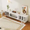 A modern living room setting with a white TV stand as the focal point, decorated with art and a rug. Anteprima dell’immagine prodotto