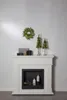 A white fireplace mantel decorated for Christmas with a wreath, gifts, and LED trees. Produktbild-Vorschau