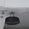 A close-up view of an adjustable foot on a white metal cabinet. Produktbild-Vorschau