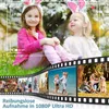 Two young girls wearing bunny ears are sitting in a grassy field with flowers. A film strip montage of family scenes is below them. Produktbild-Vorschau