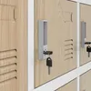 Close-up view of two locker doors with keys in the locks. Voir les images du produit