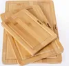A stack of three bamboo cutting boards. Produktbild-Vorschau