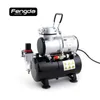A studio shot of an airbrush compressor on a white background. Podgląd zdjęcia produktu