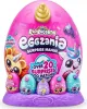 A large pink egg-shaped toy package with smaller eggs lined up in front of it. Náhled obrázku produktu