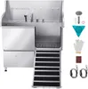 A stainless steel pet grooming tub with a ramp and various accessories displayed to the right. Anteprima dell’immagine prodotto