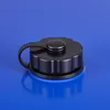 A close-up of a black water tank cap with a handle, placed on a blue surface. Náhled obrázku produktu